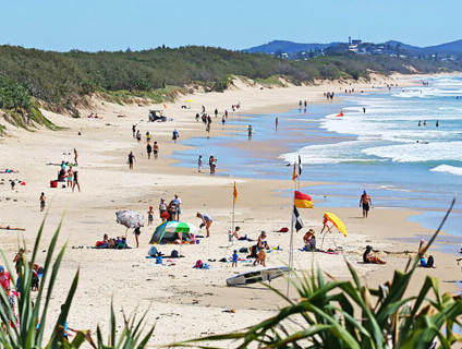 coolum beach sunbathing